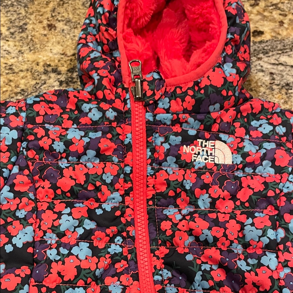 The North Face Floral Jacket with Red and Blue and soft, minky lining